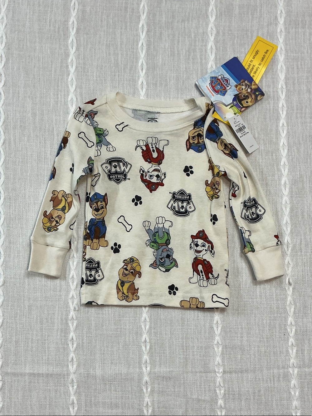 NWT Paw Patrol Cream Long-Sleeve Pajama Top with Character Allover Print